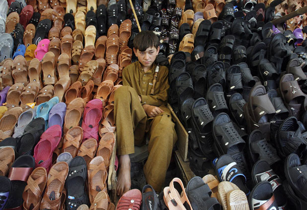 Daily Life In Pakistan: A Young Shoe Store Salesclerk 